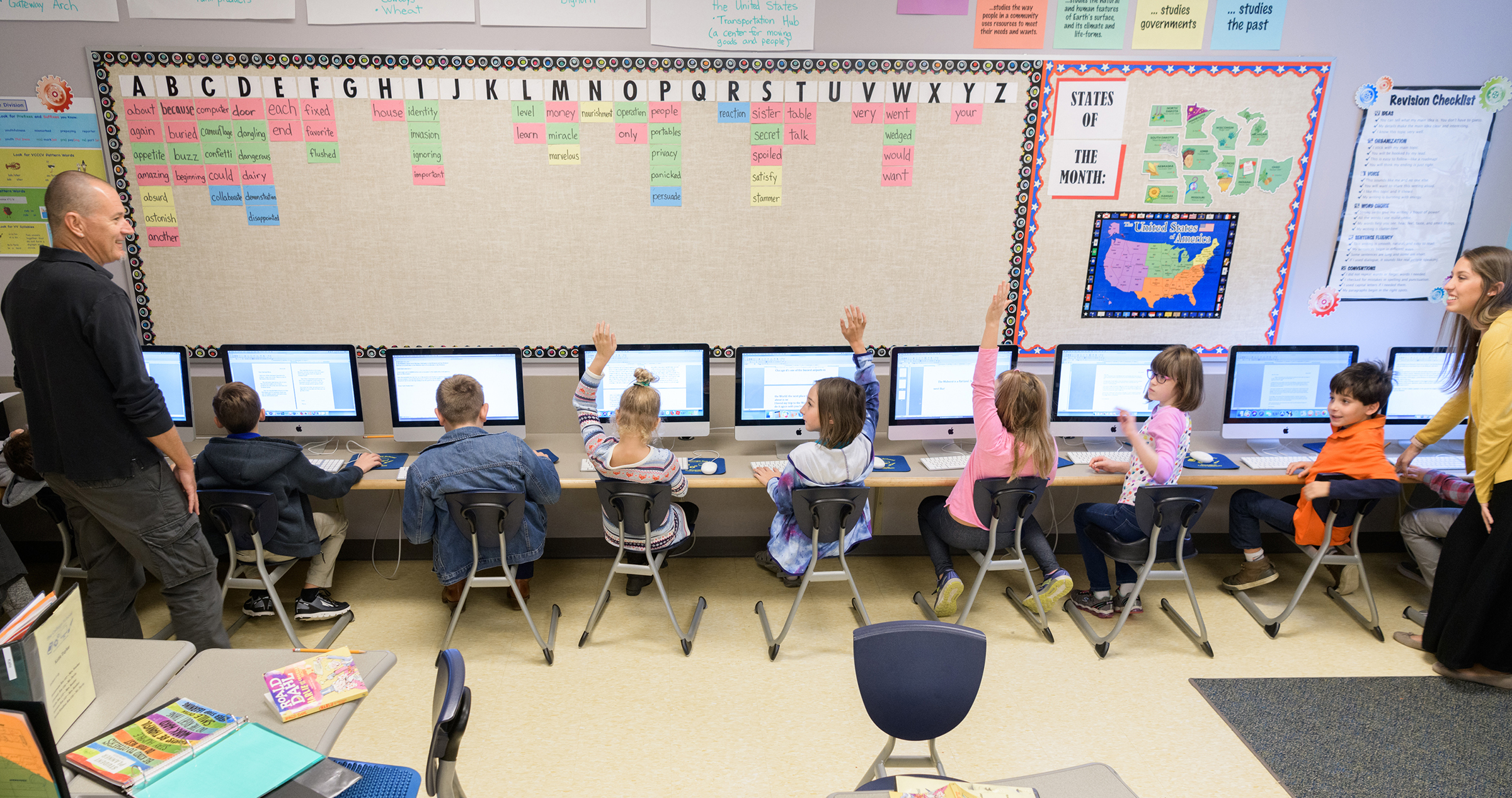 Students learning on the computer