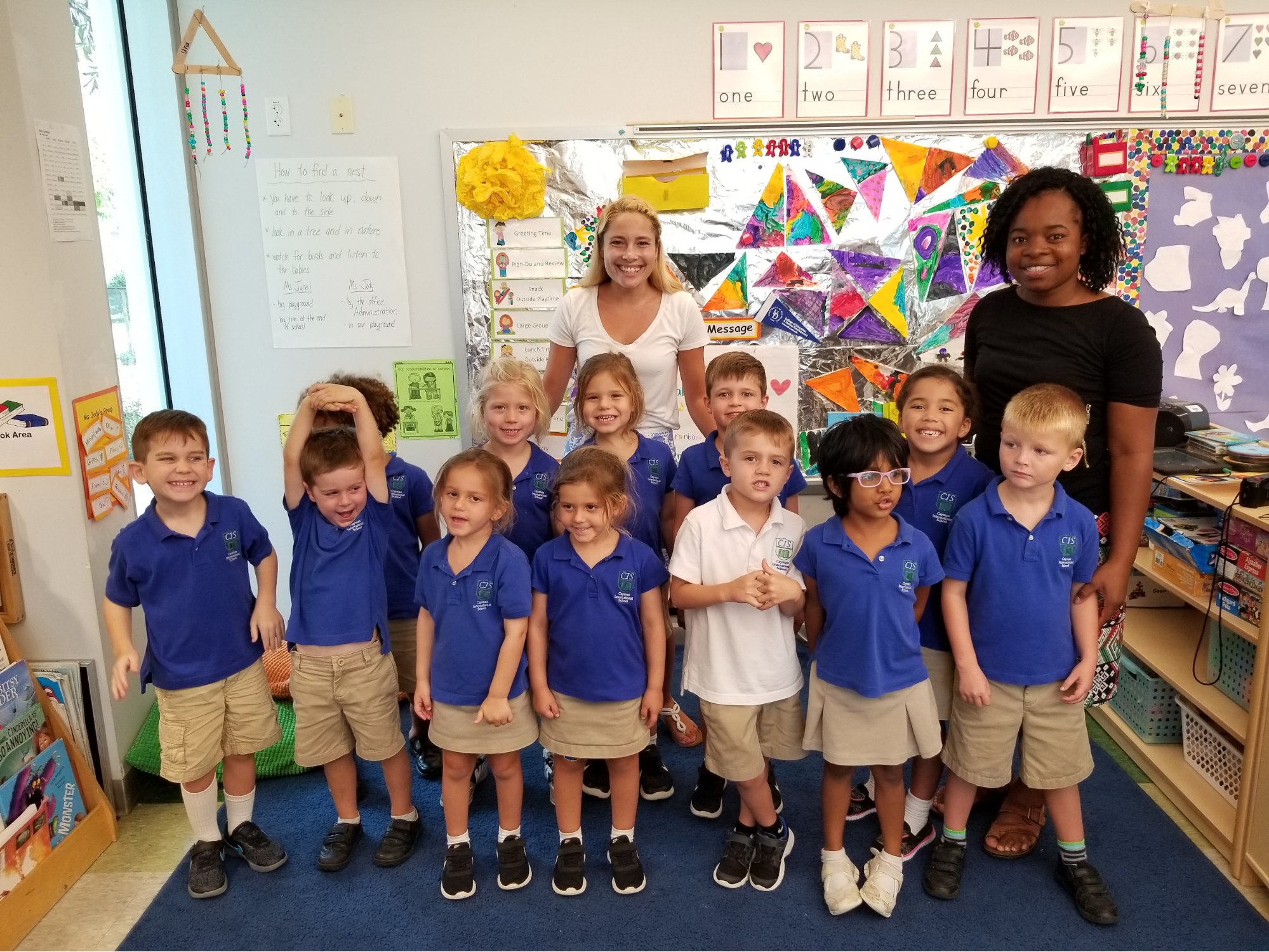 UD students pose with Cayman class on students