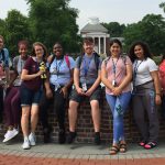 Teachers of Tomorrow students posing near fountain