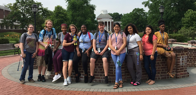 Teachers of Tomorrow students posing near fountain