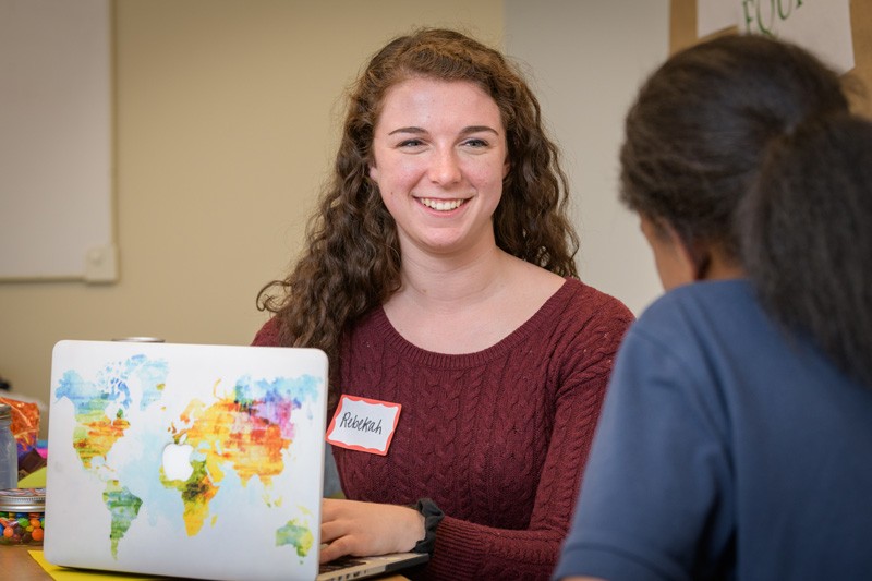 UD senior Rebekah Schrier speaks with a high school student enrolled in the School Offense Diversion Program at the Delaware Center for Justice