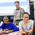 UD Associate Professor Charles Hohensee (center) oversees a summer math workshop for local high school students as part of a $750,000 National Science Foundation grant to study backward transfer