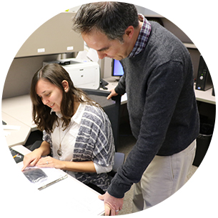 Faculty member works with graduate student