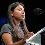 Saray Lopez speaking at the Twilight Induction Ceremony