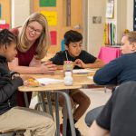 University of Delaware School of Education Professor Amanda Jansen speaks with students at Milford Central Academy