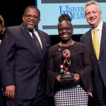 Melissa Lewis was honored with the 2020 Louis L. Redding Diversity Award. Joining her at the ceremony were (left to right) Provost Robin Morgan, Interim Vice Provost for Diversity and Inclusion Michael Vaughan and President Dennis Assanis.