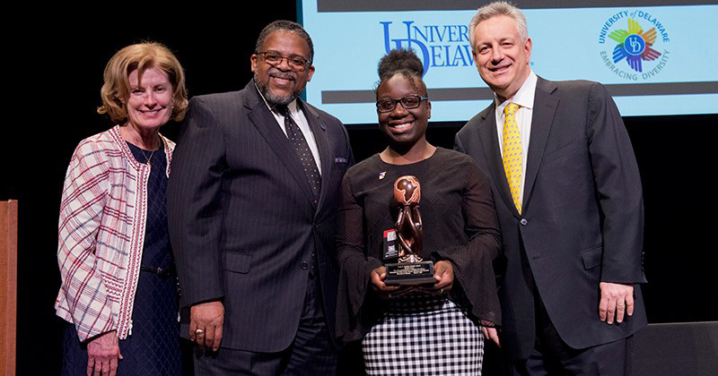Melissa Lewis was honored with the 2020 Louis L. Redding Diversity Award. Joining her at the ceremony were (left to right) Provost Robin Morgan, Interim Vice Provost for Diversity and Inclusion Michael Vaughan and President Dennis Assanis.