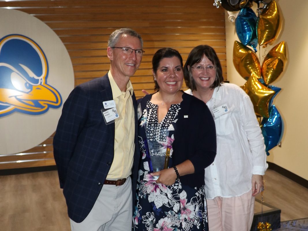 Andrew Walpole and Sharon Walpole pose with award winner Cary Riches