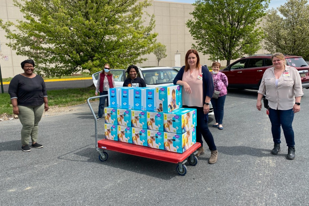 New Directions Early Head Start staff delivering diapers