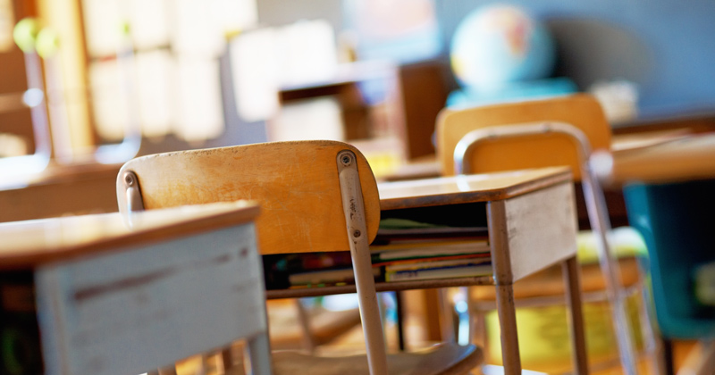 Desk in school classroom