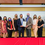 From left to right: Krissy Najera (director of DCTE), Jamie Bailey (director of UD’s Teacher Residency program), Mariela Lomeli, Alexa Cruz, Meghan Purcell (UD residents), Governor John Carney, CEHD dean Gary T. Henry, Meghan Salter, Claire Bennett, and Clark Scott (UD residents)