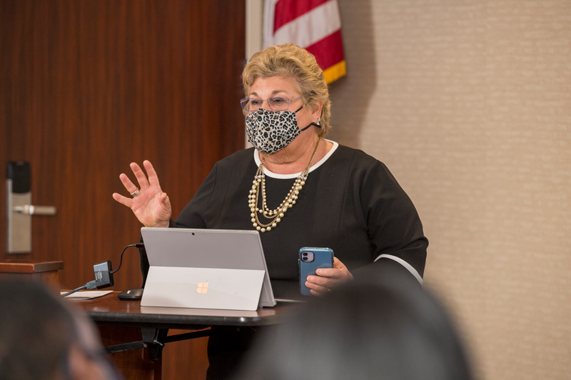 Jacquelyn Wilson, director of the Delaware Academy of School Leadership, presents at the graduation ceremony for the first cohort of Governor’s Institute of School Leadership fellows.