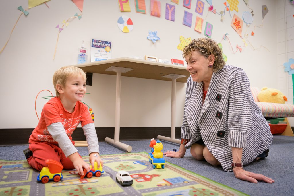 Roberta Michnick Golinkoff, Unidel H. Rodney Sharp Chair and Professor, plays with a child in her Child’s Play, Learning and Development Lab at the University of Delaware.