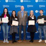 The 2022 student award winners with dean Gary T. Henry at CEHD's 2022 Steele Symposium.