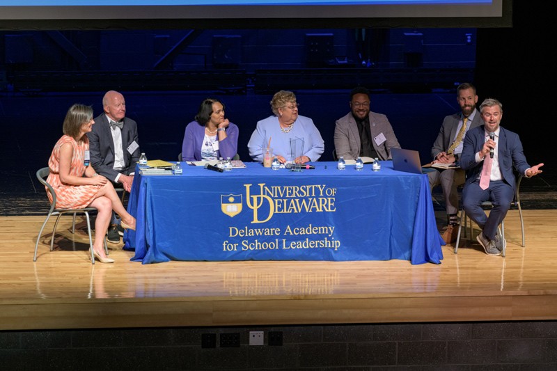 Presenters on stage at the Policy and Practice Institute