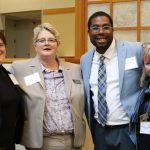 Faith Muirhead with attendees at the University of Delaware School Success Center launch event.