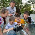 Vasyl Skrypniuk, who relocated with his family from Ukraine to Delaware, shares Stories with Clever Hedgehog with his children.