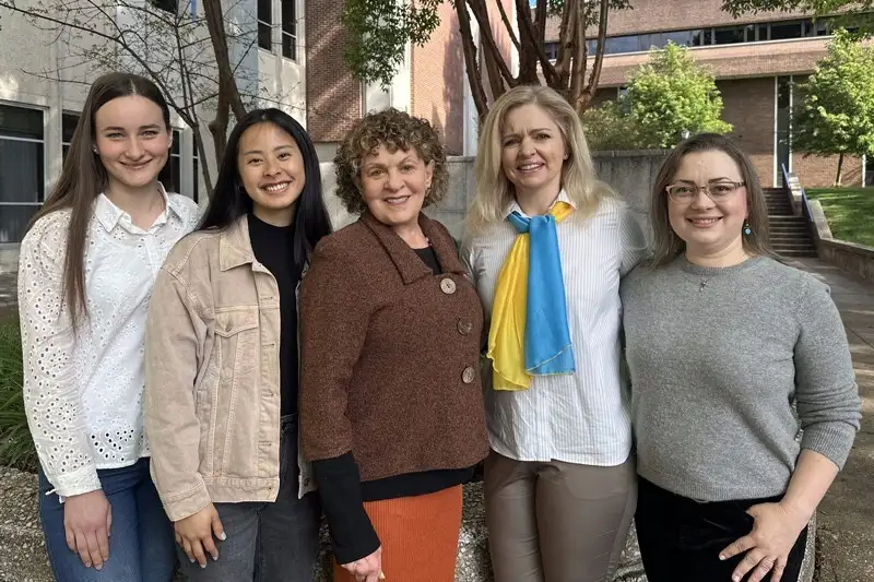 Roberta Michnick Golinkoff stands with some members of her UD team. Pictured from left to right are Yuliia Skrypniuk, project coordinator; Janelle Craig, laboratory manager of Golinkoff’s Child’s Play, Learning and Development Lab; Golinkoff; Olena Smith, UD lead geospatial information consultant; and Alisa Moldavanova, project manager and MPA program director and associate professor at UD’s Joseph R. Biden, Jr. School of Public Policy and Administration.