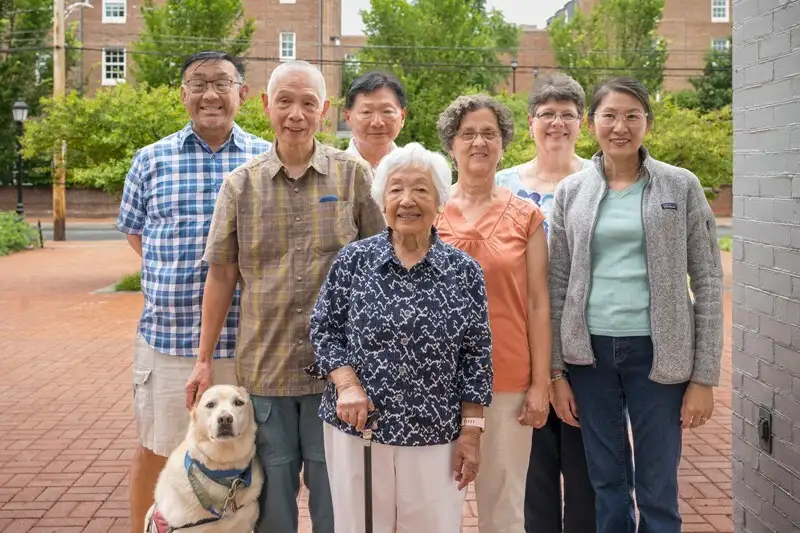 “I didn’t have much time for campus activities because I would go home to cook and care for the kids,” said Hong, pictured here with two of those “kids,” Raymond (left) and Gordon (right) Chin. All three are proud Blue Hen alumni.