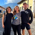 College roommates Carolina Sandoval (left) and Meg Jermain (center), 2006 graduates, lost touch after Commencement — until meeting, by chance, in Guatemala. They are pictured here along with fellow 2006 alumnus Frank Sena.