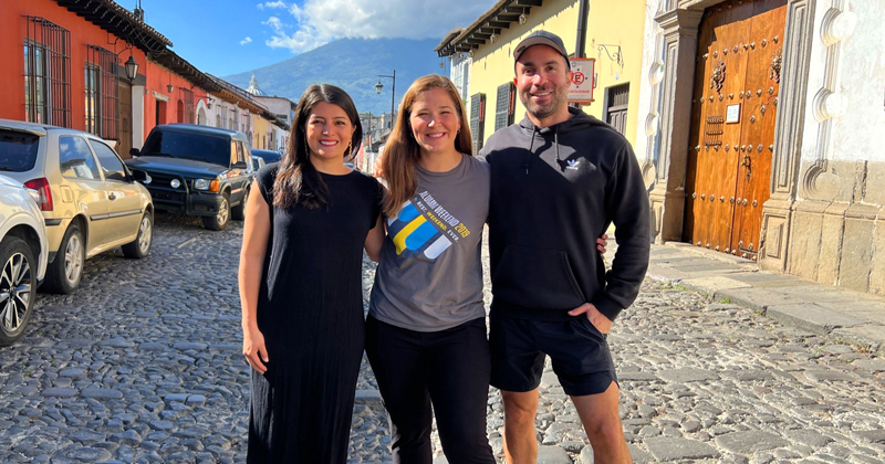 College roommates Carolina Sandoval (left) and Meg Jermain (center), 2006 graduates, lost touch after Commencement — until meeting, by chance, in Guatemala. They are pictured here along with fellow 2006 alumnus Frank Sena.