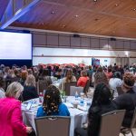 Alison Travers, assistant director of the Delaware Academy for School Leadership in the College of Education and Human Development’s School Success Center, welcomes nearly 300 participants to the sixth annual Women Leading Delaware Education conference.