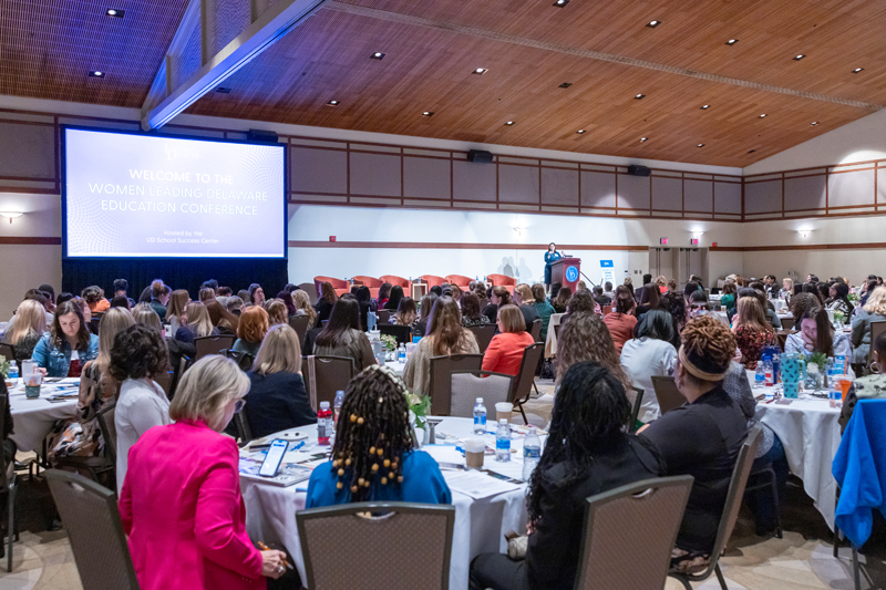 Alison Travers, assistant director of the Delaware Academy for School Leadership in the College of Education and Human Development’s School Success Center, welcomes nearly 300 participants to the sixth annual Women Leading Delaware Education conference.