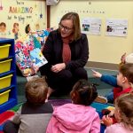 CEHD Interim Dean Rena Hallam reads to children at Kirkwood Early Childhood Education Center.