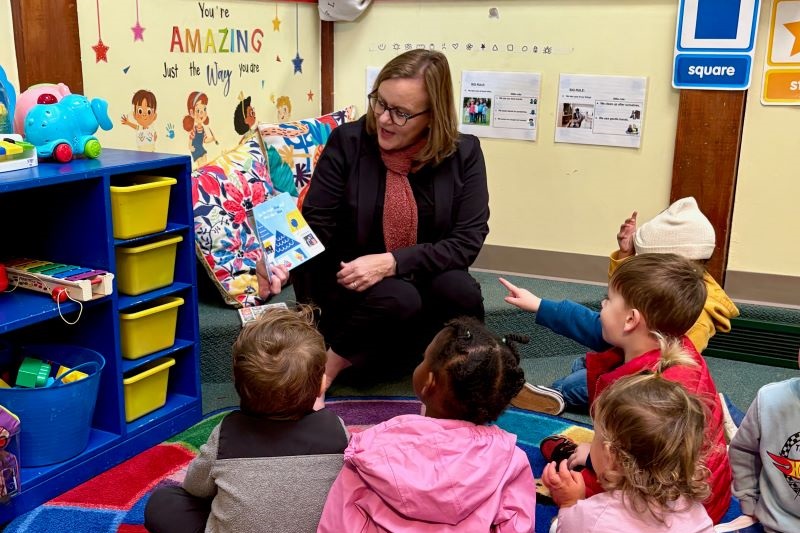 CEHD Interim Dean Rena Hallam reads to children at Kirkwood Early Childhood Education Center.