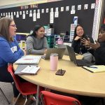 Mabel Boutte (right), principal at Etta J. Wilson Elementary School, talks with teachers Michelle Ramos, Bonnie Hernandez and Jessica Liu in a Wilson classroom.