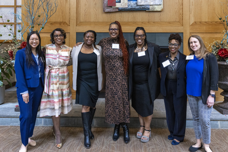 Nathalie Princilus (second from left), supervisor of grants and unique programs in the Christina School District and a CEHD alum, with her colleagues at the Women Leading Delaware Education conference. 