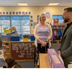 Michael Saylor visits a classroom in CEHD’s Early Learning Center and talks with Jessica Peace, one of the center’s co-directors.