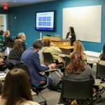 A student presents research at the 2025 Steele Symposium.