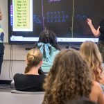 Juliet Samuel (left), a former UD teacher resident and current teacher at Mount Pleasant High School, teaches chemistry with her mentor teacher, Robin Rimback (right).