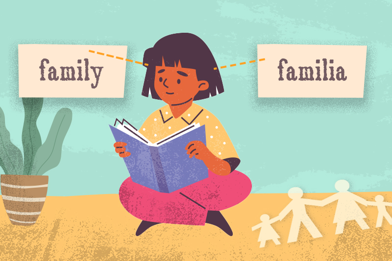 This illustration shows a young girl thinking about the words "family" and "familia" as she reads a book.