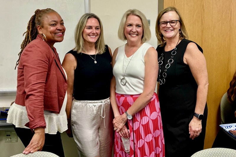 State Representatives Kamela Smith (left), Cyndie Romer (second from left) and Mara Gorman (second from right) with CEHD Dean Rena Hallam (right).