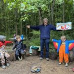 John Micklos, Jr. reads Sad, Mad, Glad: A Day Full of Feelings with children in the Lab School’s outdoor classroom.